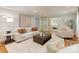 Cozy living room with stylish furniture, a rug, and view into another living area at 9439 White Hemlock Ln, Charlotte, NC 28270