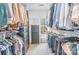 Walk-in closet featuring clothing racks and a dresser at 9803 Forest Run Ln, Charlotte, NC 28277