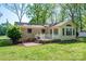 Brick home with a sunroom and lush green backyard at 1 Horace Grigg Cir, Shelby, NC 28152