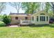 The backyard provides the perfect outdoor retreat with a patio and well-manicured lawn at 1 Horace Grigg Cir, Shelby, NC 28152
