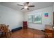 Cozy bedroom with hardwood floors, natural light, and a ceiling fan at 1 Horace Grigg Cir, Shelby, NC 28152