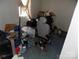 Bedroom featuring a power wheelchair, window with curtains, and personal items at 107 N Rudisill Ave, Cherryville, NC 28021