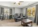 Comfortable living room with recliner chairs, a coffee table, and a view of the outdoors at 111 Woodfern Pl, Mooresville, NC 28115