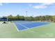 The neighborhood park features an inviting tennis court with well-maintained playing surface at 111 Woodfern Pl, Mooresville, NC 28115