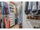 Organized walk-in closet with shelving, drawers, and hanging space for clothes and shoes at 111 Woodfern Pl, Mooresville, NC 28115