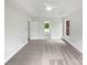 Bright and airy bedroom with neutral carpet and adjacent bathroom view at 1121 Setter Se Ln, Concord, NC 28025