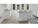 Eat-in kitchen with white cabinets, granite countertops and stainless steel appliances at 1121 Setter Se Ln, Concord, NC 28025