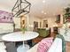 Eat-in kitchen featuring stainless appliances, island with sink, hardwood floors, and pendant lighting at 1126 Concord Rd, Davidson, NC 28036