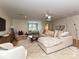 Inviting living room featuring plush seating, stylish decor, and a cozy nook in a well-lit space at 1126 Concord Rd, Davidson, NC 28036
