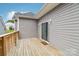 Charming wooden deck that offers a tranquil outdoor living space at 113 Mcgill Nw Ave, Concord, NC 28025