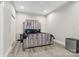 Bedroom featuring a modern bed with a mirrored headboard and sleek nightstands at 113 Mcgill Nw Ave, Concord, NC 28025