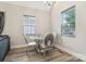 Cozy dining area featuring a modern glass table, sleek chairs and a chandelier at 113 Mcgill Nw Ave, Concord, NC 28025