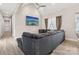 Comfortable living room with vaulted ceilings, hardwood floors and decorative curtains at 113 Mcgill Nw Ave, Concord, NC 28025