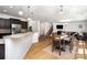 Open kitchen with dark cabinetry, stainless steel appliances, and granite countertops at 1176 Shiloh Bend Trl, Fort Mill, SC 29715