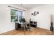 Bright home office with hardwood floors, a large window, and modern decor at 1176 Shiloh Bend Trl, Fort Mill, SC 29715