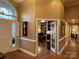 Beautiful foyer featuring hardwood floors, grand entryway, and views into the living space at 121 General Pemberton St, Stanley, NC 28164