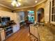 Well-equipped kitchen with stainless steel appliances, granite countertops, and seamless access to dining at 121 General Pemberton St, Stanley, NC 28164