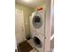 Functional laundry room with stacked washer and dryer, providing convenience and space efficiency at 121 General Pemberton St, Stanley, NC 28164