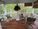 Relaxing porch with comfortable seating and view of a lush landscape, a great place to sit and relax outdoors at 121 General Pemberton St, Stanley, NC 28164