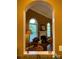 Inviting sitting area with a cozy fireplace, natural light, and a tranquil view of the outside at 121 General Pemberton St, Stanley, NC 28164