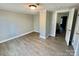 Bedroom with neutral walls and access to hall at 121 W 11Th St, Oakboro, NC 28129