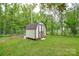 Backyard with a well-maintained storage shed and green lawn at 1222 Glenarden Dr, Rock Hill, SC 29730