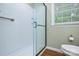 Bathroom showcasing the glass door of a shower and new neutral paint at 1222 Glenarden Dr, Rock Hill, SC 29730