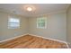 Bright and airy bedroom with neutral walls, new window, and updated laminate flooring at 1222 Glenarden Dr, Rock Hill, SC 29730