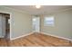 Bedroom with updated laminate flooring, fresh neutral paint and ample sunlight at 1222 Glenarden Dr, Rock Hill, SC 29730