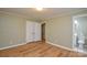 Bright bedroom featuring hardwood floors and neutral walls at 1222 Glenarden Dr, Rock Hill, SC 29730