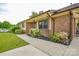 Well-maintained home with beautiful landscaping and walkway to the front door at 1222 Glenarden Dr, Rock Hill, SC 29730