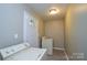 Functional laundry room with washer and dryer hookups and an exterior door for convenience and practicality at 1222 Glenarden Dr, Rock Hill, SC 29730