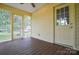 Cozy screened porch offering an open view to the outdoors through screened windows at 1222 Glenarden Dr, Rock Hill, SC 29730