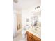 Clean bathroom with shower-tub combination, single sink vanity, and neutral decor at 123 Coachman Loop, Statesville, NC 28625