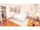 Bedroom with hardwood floors, modern bed frame and light neutral paint at 123 Coachman Loop, Statesville, NC 28625