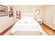 Cozy bedroom featuring a decorative chandelier, eclectic art pieces, and comfortable decor at 123 Coachman Loop, Statesville, NC 28625