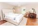 Light and bright bedroom with hardwood floors and classic furnishings at 123 Coachman Loop, Statesville, NC 28625