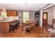 Open kitchen with eat-in bar and an adjacent dining area with plenty of seating at 123 Coachman Loop, Statesville, NC 28625