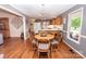 Eat-in kitchen boasts a chandelier, wooden table and wood cabinets at 123 Coachman Loop, Statesville, NC 28625