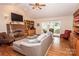 Bright living room with hardwood floors, fireplace and sliding glass doors to the outside at 123 Coachman Loop, Statesville, NC 28625