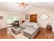 Cozy living room with a large sectional sofa and sliding doors to the back at 123 Coachman Loop, Statesville, NC 28625
