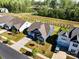 Aerial view showcasing a neighborhood, highlighting the home's location and surrounding community at 12512 Journeys End Trl, Huntersville, NC 28078