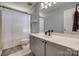 Neutral bathroom featuring a vanity, updated fixtures, and a shower-tub combo at 1252 Spring View Ct, Rock Hill, SC 29732