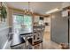 Eat-in kitchen area with ample seating and natural light from sliding glass doors at 1252 Spring View Ct, Rock Hill, SC 29732