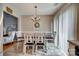 Traditional dining room with modern chandelier and neutral wall color at 1252 Spring View Ct, Rock Hill, SC 29732