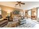 Comfortable living room with neutral tones, stylish rug, and plenty of natural light at 14926 Chilgrove Ln, Huntersville, NC 28078