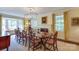 Elegant dining room boasts a fireplace, large windows, and a spacious layout for formal entertaining at 1943 S Wendover Rd, Charlotte, NC 28211