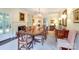 Elegant dining room boasts a fireplace, large windows, and a spacious layout for formal entertaining at 1943 S Wendover Rd, Charlotte, NC 28211
