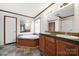 Primary bathroom boasts soaking tub, double vanity, and tiled flooring at 1981 Line Rd, Lancaster, SC 29720