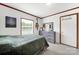 Cozy bedroom with soft carpet, comfortable bed, and ample natural light from the window at 1981 Line Rd, Lancaster, SC 29720